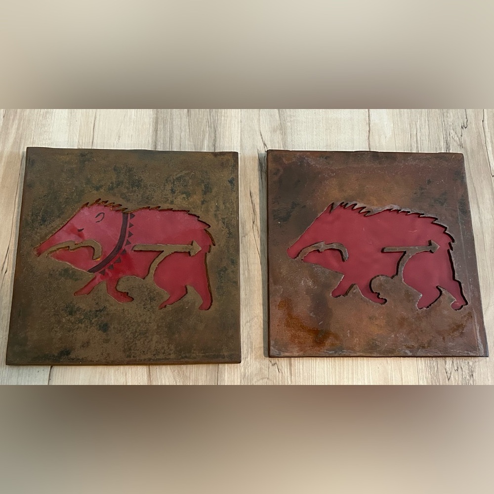 Laser cut metal tiles. Two Javelinas.